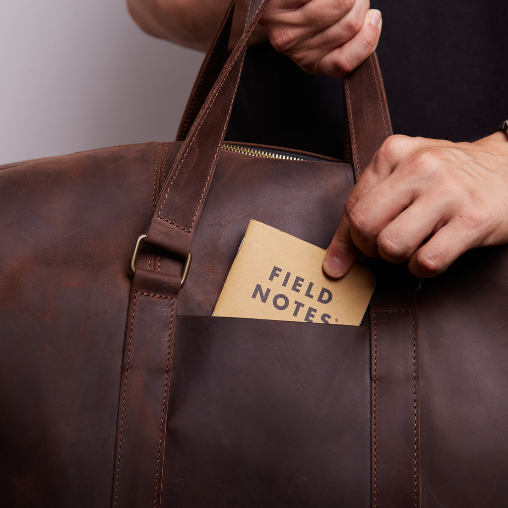 Todo en bolsa de viaje de cuero
