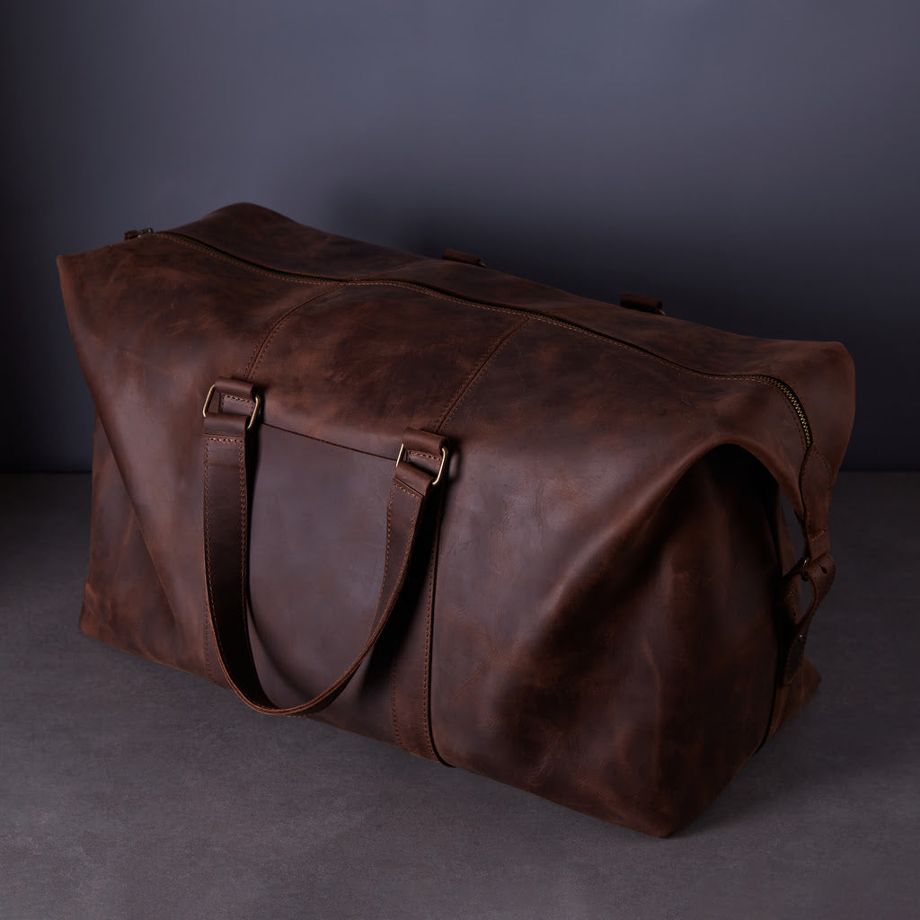 Todo en bolsa de viaje de cuero