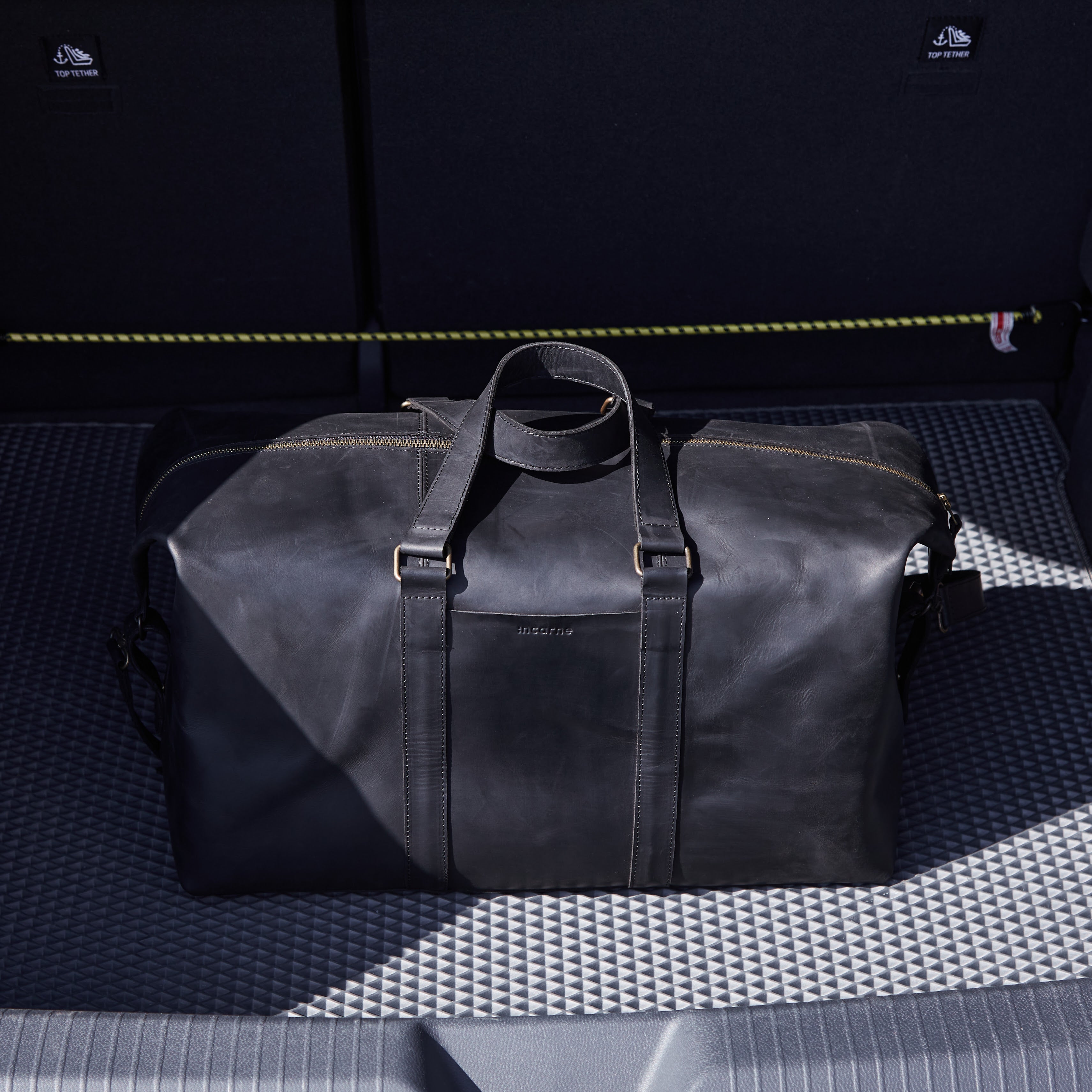 Todo en bolsa de viaje de cuero