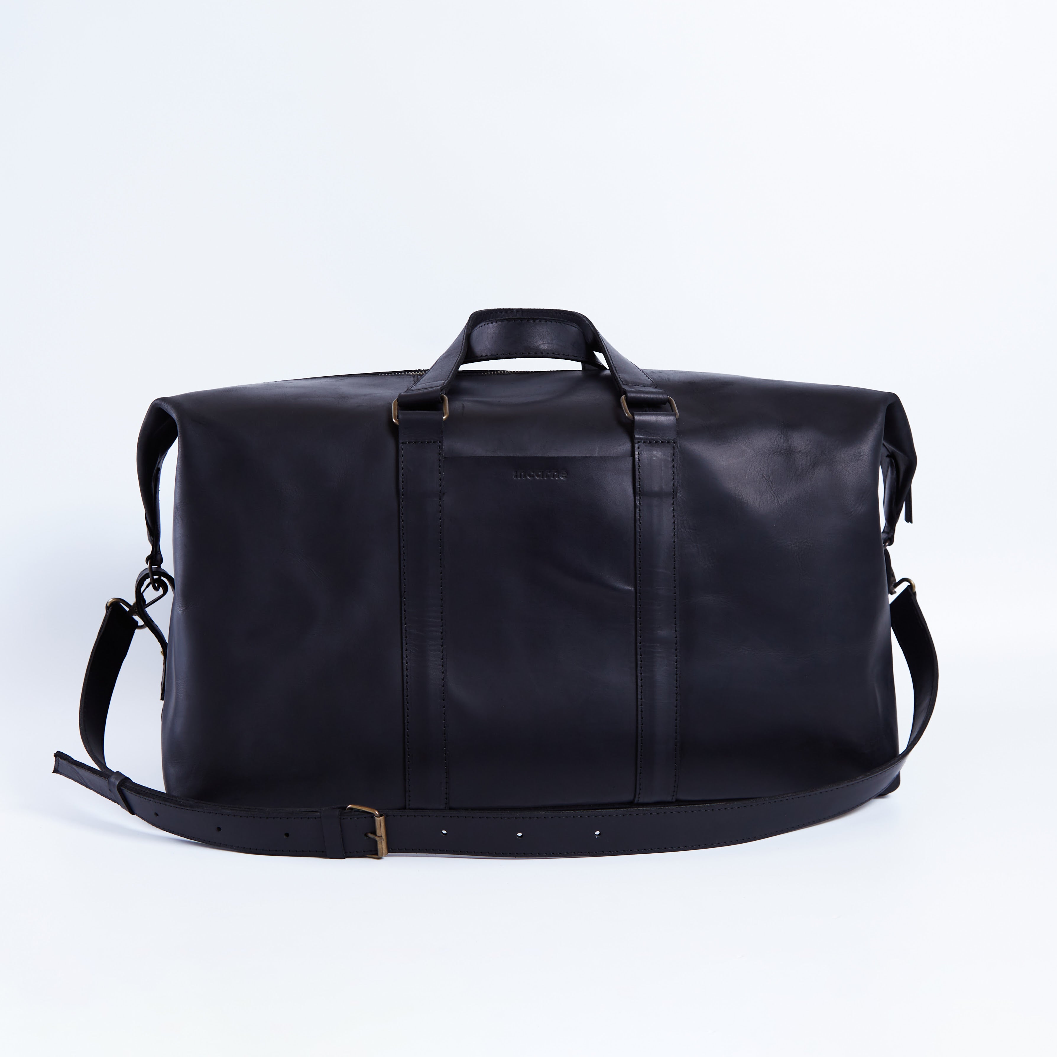 Todo en bolsa de viaje de cuero