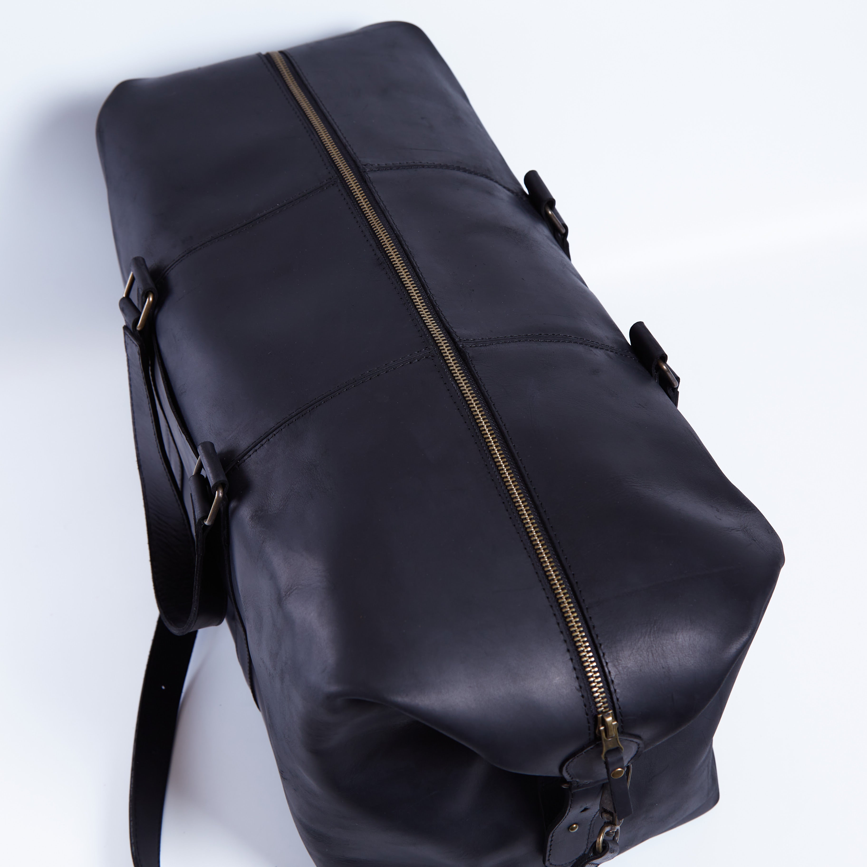 Todo en bolsa de viaje de cuero