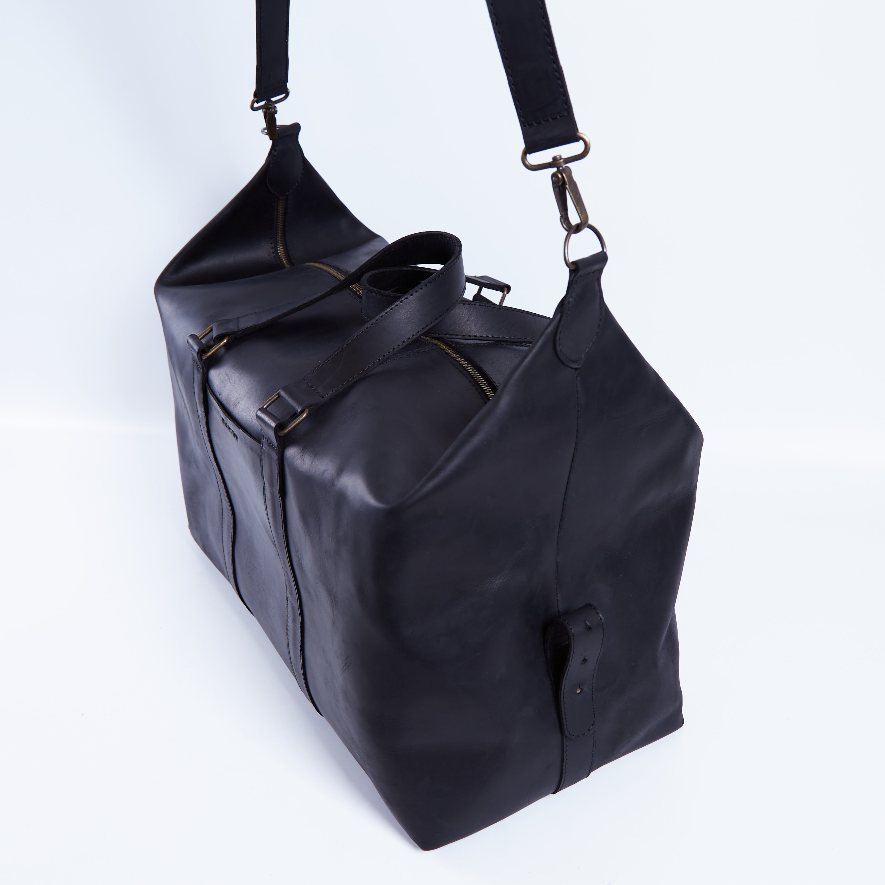 Todo en bolsa de viaje de cuero