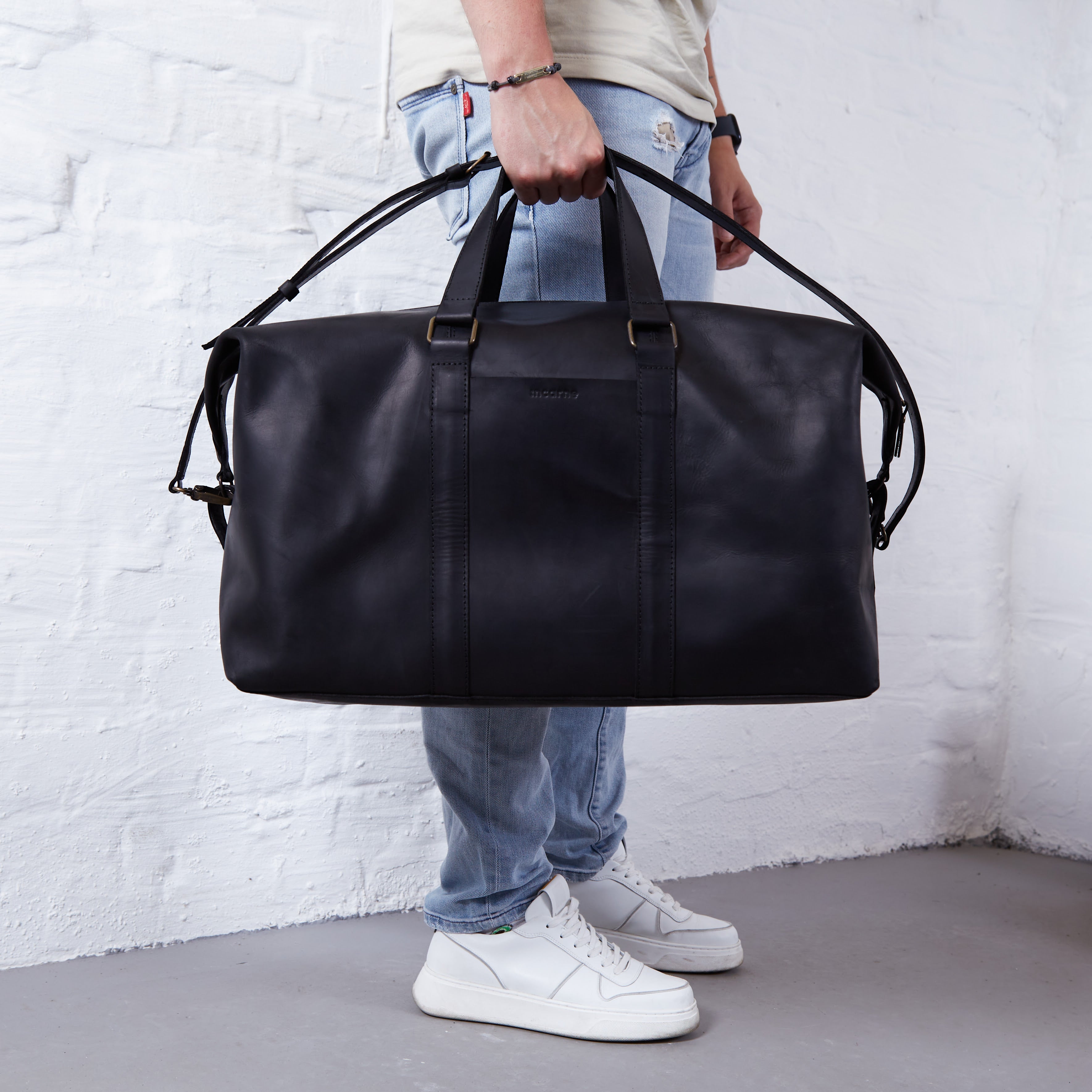 Todo en bolsa de viaje de cuero