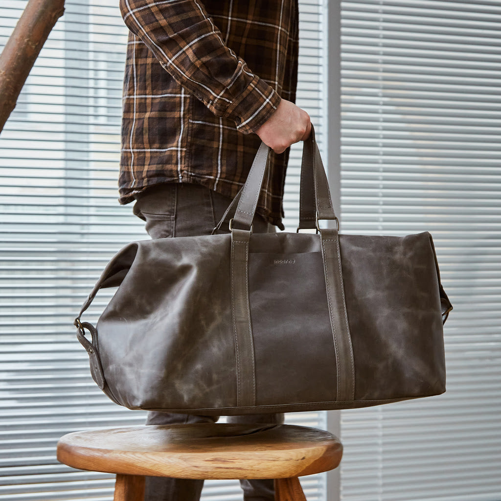Todo en bolsa de viaje de cuero