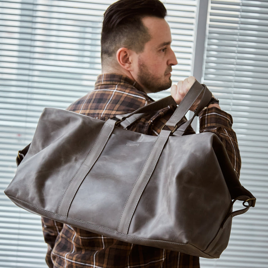 Todo en bolsa de viaje de cuero