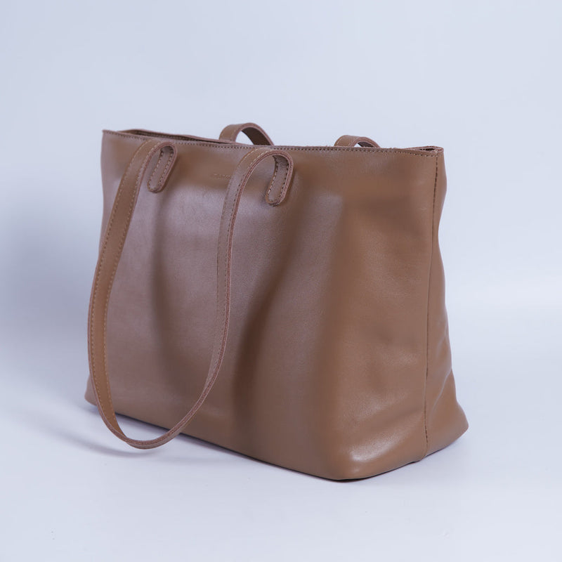 Spacious women's shopper bag with a laptop compartment made from classic leather Emeli