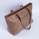 Spacious women's shopper bag with a laptop compartment made from classic leather Emeli