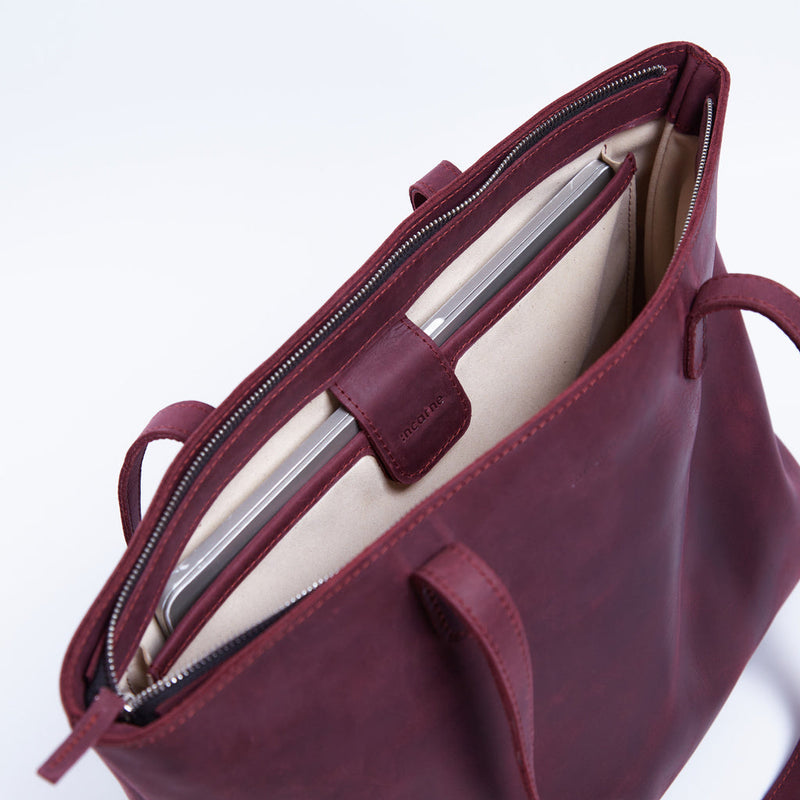 Spacious women's shopper bag with a laptop compartment made from vintage leather Emeli