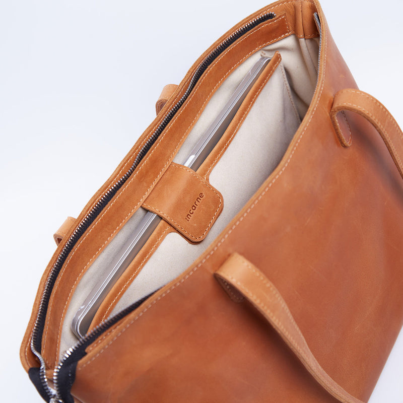 Spacious women's shopper bag with a laptop compartment made from vintage leather Emeli