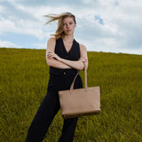 Spacious women's shopper bag with a laptop compartment made from classic leather Emeli