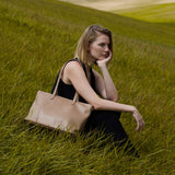 Spacious women's shopper bag with a laptop compartment made from classic leather Emeli