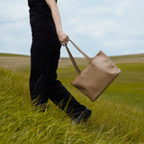 Spacious women's shopper bag with a laptop compartment made from classic leather Emeli