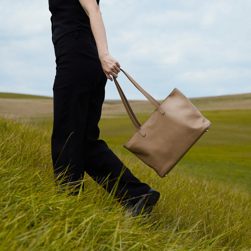 Spacious women's shopper bag with a laptop compartment made from classic leather Emeli