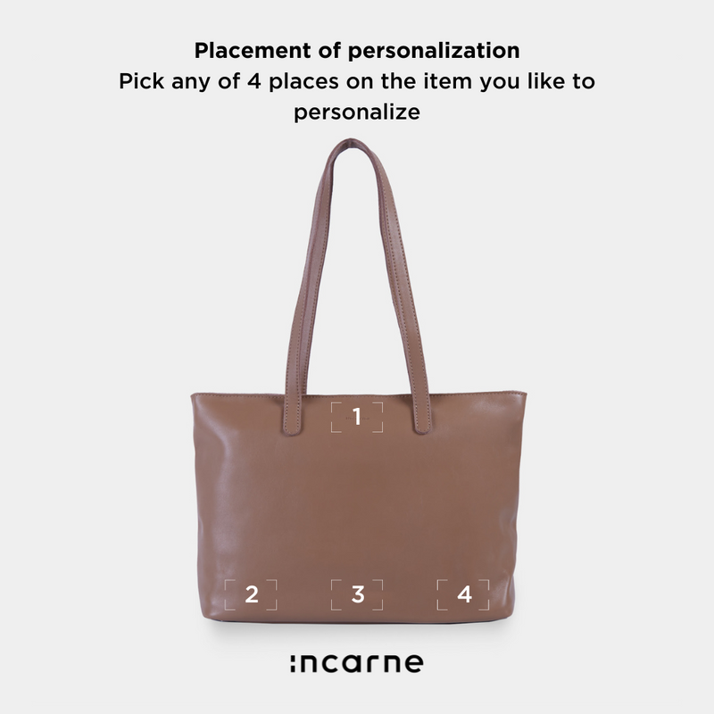 Spacious women's shopper bag with a laptop compartment made from classic leather Emeli