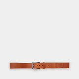 Nuevo cinturón de cuero minimalista paralelo